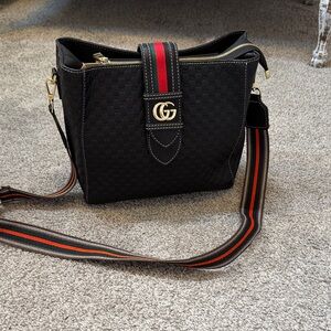 Black Crossbody purse with gold hardware